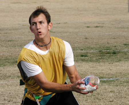 Sophomore Tony Winkler snags the frozen turkey from the air during the First Annual Turkey Bowl sponsored by the Young Alumns. - Photo by Jonathan Blair