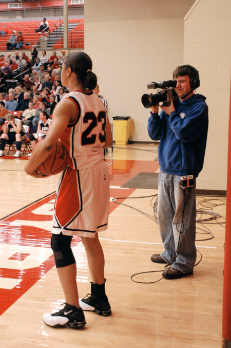 Senior Broadcasting major Patrick Compau mans one of the floor cameras for UBS during the broadcast of the Lady Bulldogs vs. Lambuth.  - Photo by Kristen Nicole Sayres