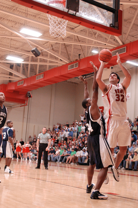 Junior Bruno Martinessi (32) shoots over a Lambuth defender. - Photo by Kristen Nicole Sayres