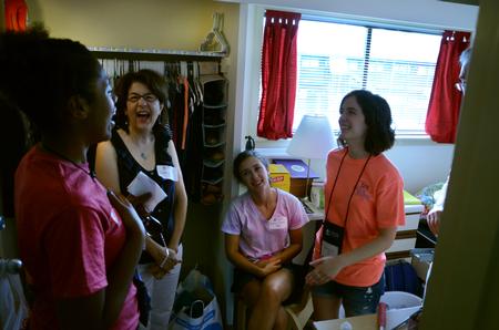 Mandisa Wofford (left), senior economics major, meets Elizabeth Hill, one of her freshman focus students, during New Student Move-in.   - Photo by Ebbie Davis