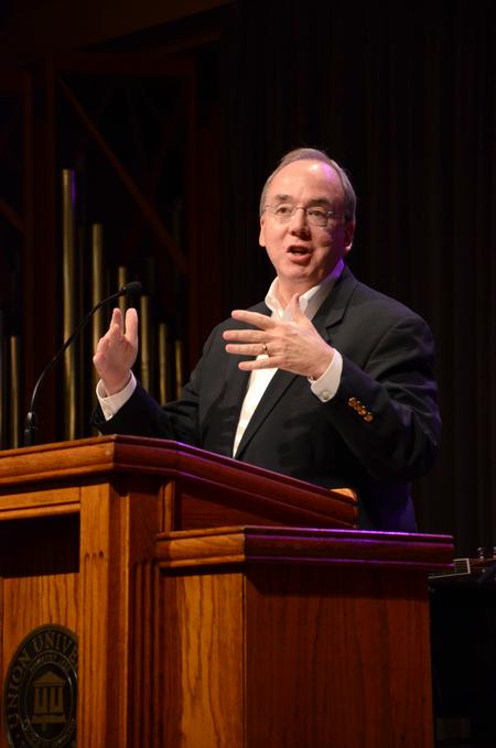 David S. Dockery, president of the university, welcomes new students and their families during a time of worship in the GM Savage Memorial Chapel. - Photo by Jacob Moore