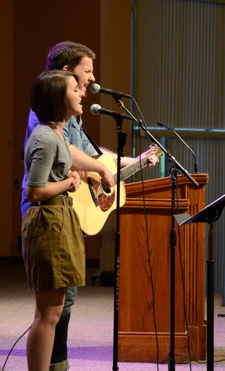 Natalie Wittman, senior English major, and T.J. Hester, senior philosophy major, lead music in the GM Savage Memorial Chapel during a service for new students and their families. - Photo by Jacob Moore