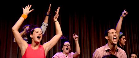 Focus leaders entertain the incoming freshmen at their annual Focus Show, by acting out skits and singing songs.  - Photo by Ebbie Davis