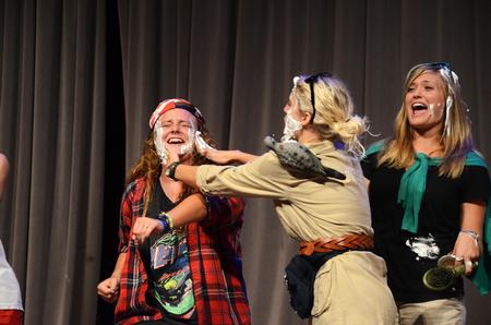 Megan Coley, junior elementary education, Mazie Walthall, senior nursing major, and Andi Schreiber, senior family studies, do a skit with shaving cream at the annual Focus Show. - Photo by Zac Calvert