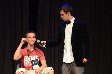 TJ Simpson, freshman, is interviewed by Andy Seaton, senior Christian studies major, during the annual Focus Show. - Photo by Zac Calvert