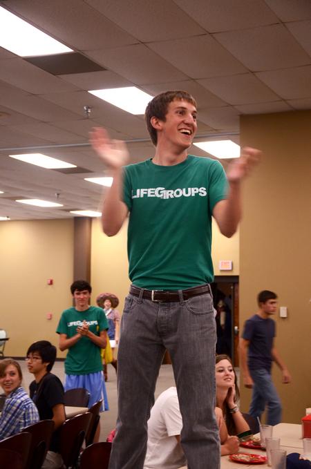 Zach McMillan, sophmore intercultural studies major, starts a flashmob in the Brewer Dining Hall to promote Lifegroups to new students. - Photo by Zac Calvert