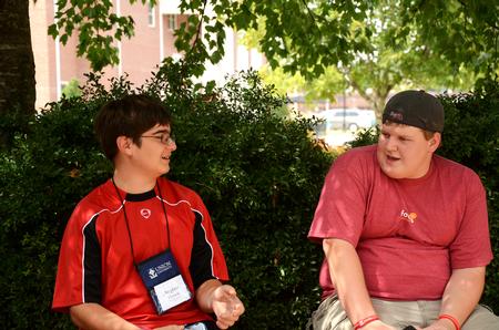 Freshmen Steven Clement, computer science major, and Grant Wilson, business marketing major, talk together during Focus week. - Photo by Zac Calvert