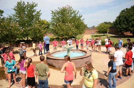 New freshmen circle up around the fountain for games during Focus week. - Photo by Zac Calvert