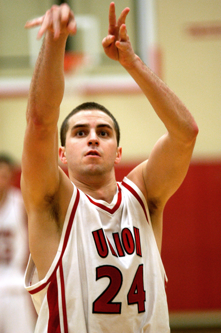 Senior guard Will Harris (24) follows through on a free throw attempt. - Photo by Jonathan Blair