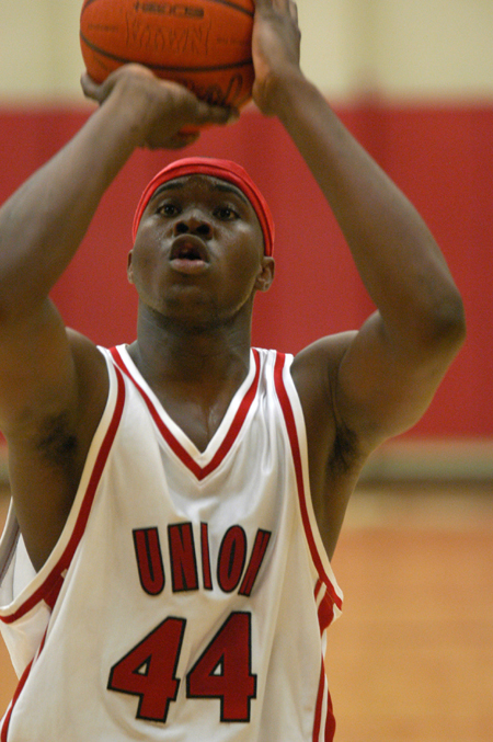Freshman forward Pierry Valmeria takes a free throw during Union's game with Lyon College. - Photo by Jonathan Blair
