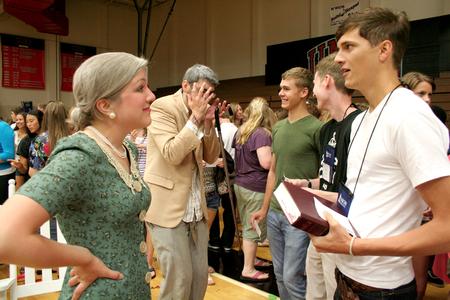Amelia Krauss, junior journalism major, talks with Nick Flemming, freshman theatre and speech major, during the LifeGroup presentations for new students. - Photo by Deanna Santangelo