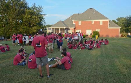 David and Lanese Dockery, president and first lady of the university, host several new students at their home for an ice cream social.  - Photo by Morris Abernathy