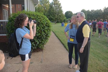 Focus leader Andi Schreiber has her photo made with David S. Dockery, president of the university, during the annual ice cream social. - Photo by Morris Abernathy