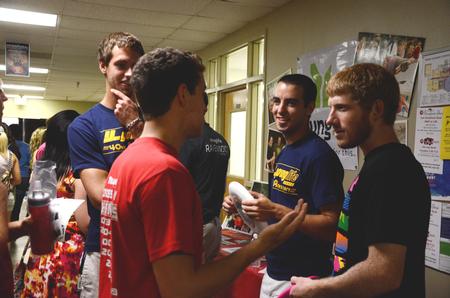 The incoming freshman class mingle at the Student Activity Fair held in the Penick Academic Center, allowing the new students to get involved with campus life.  - Photo by Ebbie Davis