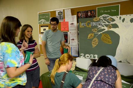 Life Group leaders encourage incoming freshmen to sign up for Life Groups at the Student Activity Fair. - Photo by Ebbie Davis