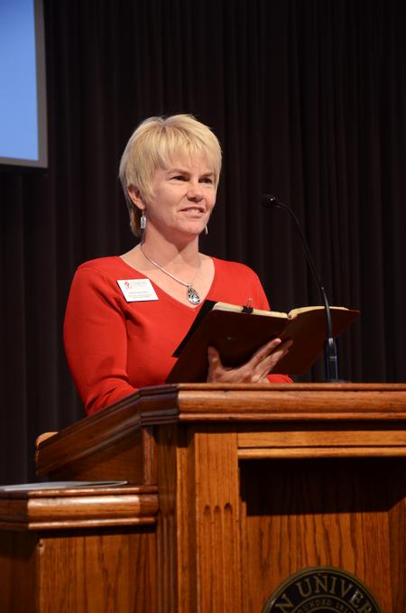 Kathy Southall, director of prayer ministry and encouragement, reads from Psalm 66 to begin chapel.   - Photo by Zac Calvert