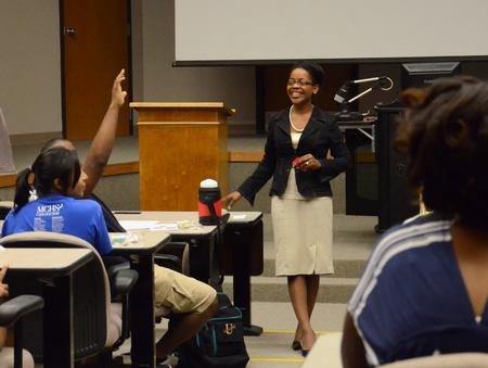 Renee Jones, associate director of the vocatio center for life calling and career, speaks to minority students during S.O.A.R. Orientation about resources available to help achieve success in college education. - Photo by Jacob Moore
