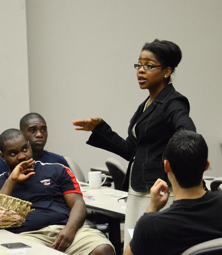 Renee Jones, associate director of the vocatio center for life calling and career, speaks to minority students during S.O.A.R. Orientation about resources available to help achieve success in college education. - Photo by Jacob Moore