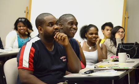 Dennis Reggans, senior psychology major, listens during S.O.A.R. Orientation about resources available to help achieve success in college education. - Photo by Jacob Moore