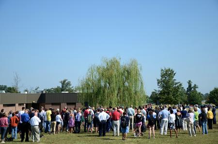 The Union community gathers at the tree planted in memory of the September 11, 2001, terrorist attacks. This memorial service took place for the 10 year reunion of the attacks. - Photo by Ebbie Davis