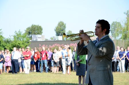 The Union community gathers at the tree planted in memory of the September 11, 2001, terrorist attacks. This memorial service took place for the 10 year reunion of the attacks. - Photo by Ebbie Davis