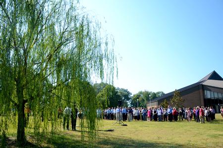 The Union community gathers at the tree planted in memory of the September 11, 2001, terrorist attacks. This memorial service took place for the 10 year reunion of the attacks. - Photo by Ebbie Davis
