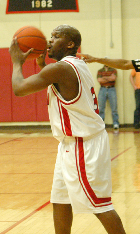 Senior guard Chima Abakwue (3) looks to pass in Union's 68-65 overtime win versus Martin Methodist.   - Photo by Courtney Ross