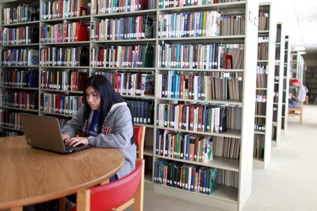 Students use their laptops to study in the Emma Waters Summar Library. - Photo by Kristi McMurry Woody