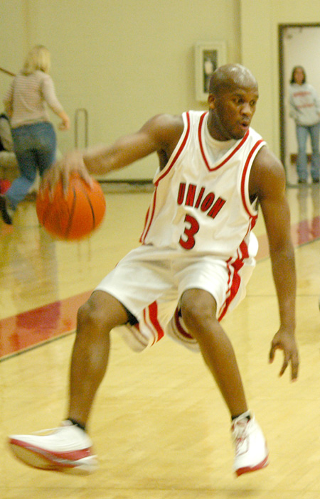 Senior guard Chima Abakwue (3) controls the ball for Union. - Photo by Courtney Ross
