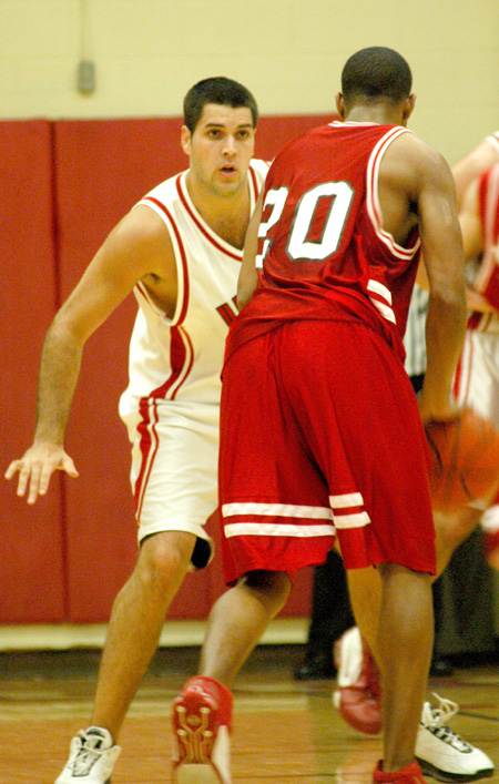 Junior forward Bruno Martinessi (32) gets in position to stop his man on defense.   - Photo by Courtney Ross