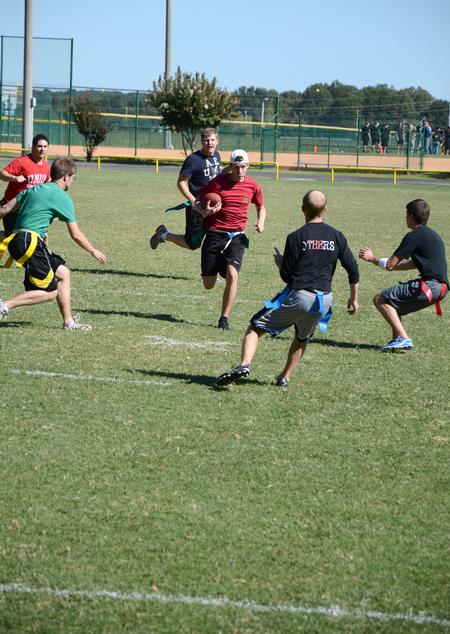 Bryan Meeker, sophomore business administration major, runs down the field during a game of flag football on Family Weekend. - Photo by Jacob Moore