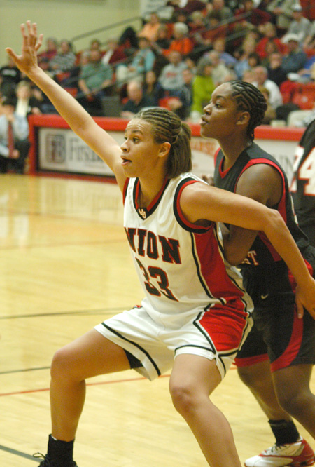 Junior forward Stephanie Clark posts up on a Martin Methodist player in Union's win. - Photo by Steven Aldridge