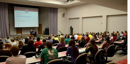 Harvey Hall is filled with students while David S. Dockery, president of the university, speaks during the Student Senate meeting. - Photo by Jacob Moore