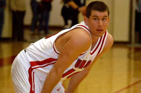 Senior guard Jonathan Kee gets a rest during a free throw. - Photo by Jonathan Blair