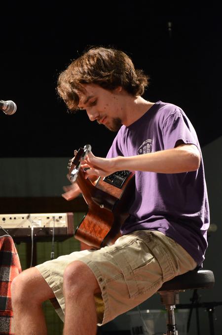 Andrew Pearson, sophomore Christian studies major, performs on the guitar for Open Mic in Barefoots Joe. - Photo by Zac Calvert