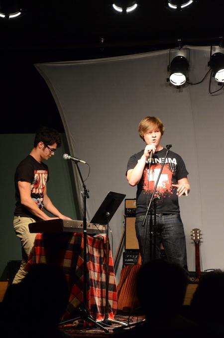 Collin Brown, freshman music major, and Gregory Lewis, freshman undecided major, sing and rap at Open Mic in Barefoots Joe.  - Photo by Zac Calvert