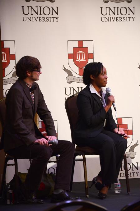 Greg Thornbury, dean of the school of theology and missions, and Versie Hamlett, principal of Andrew Jackson Elementary Magnet School and elementary leader in Jackson/Madison county, answer questions as part of a panel set up by the School of Education.  The panel was preceded by the viewing of the film "Race to Nowhere", which is about the faults of American education. - Photo by Zac Calvert