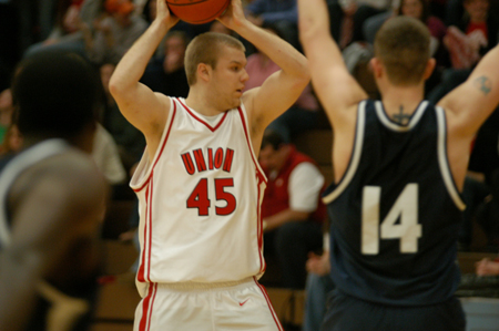 Senior forward Andrew Gamble (45) looks to pass in Union's win over Berry College. - Photo by Jonathan Blair