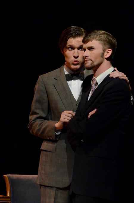 Peter Riggs, sophomore philosophy major, talks to Ben Haws, junior media communications major, about "bunburying" in the theater production of "The Importance of Being Earnest." - Photo by Anne Richoux