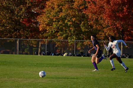 Eboni Murphy races a Tennessee Nazarene player for the ball during a recent soccer game. The Lady Bulldogs won the game 4-2.  - Photo by Anne Richoux