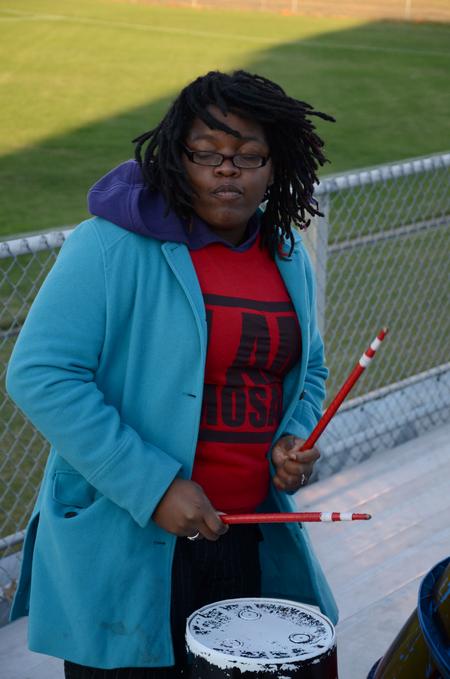 Treasure Hightower, senior digital media studies major, plays with the drum line at the Lady Bulldog soccer game against Trevecca Nazarene University.  - Photo by Anne Richoux
