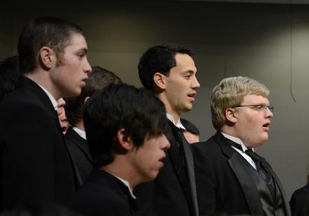 Sam Ritter, senior music performance major, and Adam Stanford, sophomore music education major, perform during the annual Fall Choral Concert. - Photo by Jacob Moore