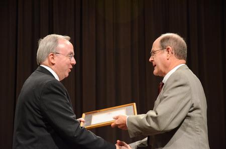 David S. Dockery, president of the university, awards Dr. Jerol Swaim, president of Williams Baptist College, with the Distinguished Alumnus Award during the Homecoming Reunion Chapel. - Photo by Zac Calvert