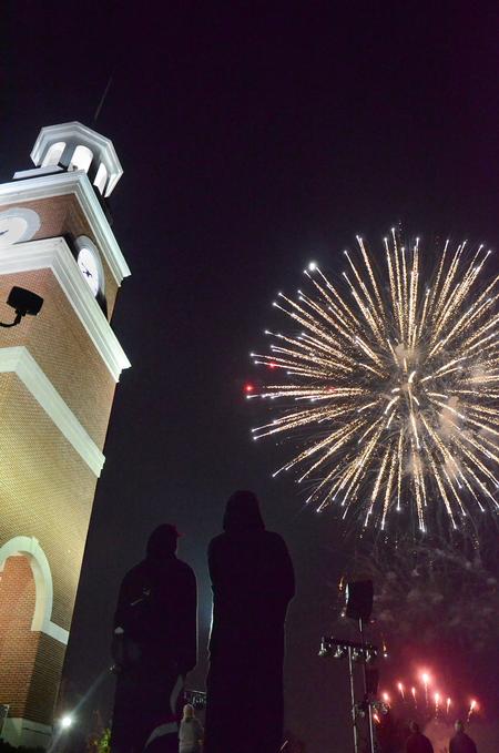 Students watch the fireworks show near Miller Tower during Union Night at Homecoming. - Photo by Zac Calvert