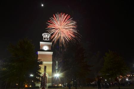 Homecoming 2011 brought a new look for Miller Tower on the campus of Union University.  Fireworks lit up the night sky for friends, students and faculty gathered on the lawn. - Photo by Morris Abernathy