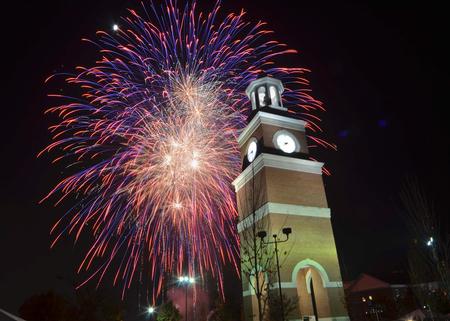 Homecoming 2011 brought a new look for Miller Tower on the campus of Union University.  Fireworks lit up the night sky for friends, students and faculty gathered on the lawn. - Photo by Morris Abernathy