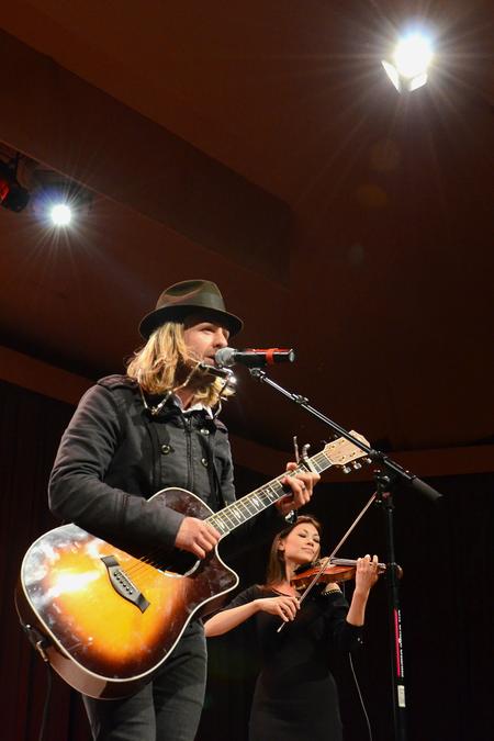 Jon Foreman, musician and lead vocalist of Switchfoot, plays with violinist Ann Marie Calhoun during the Homecoming Concert. - Photo by Jacob Moore