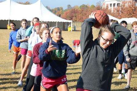 Teams made of different student groups around campus compete in a relay race during Homecoming Olympics.
 - Photo by Jacob Moore