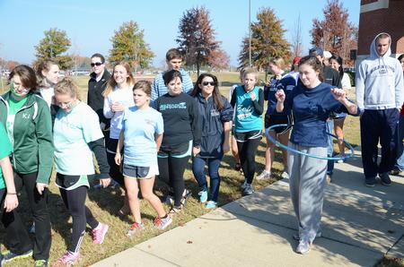 Hannah Strickland, senior elementary education major, participates in a hula-hoop competition during Homecoming Olympics. - Photo by Jacob Moore