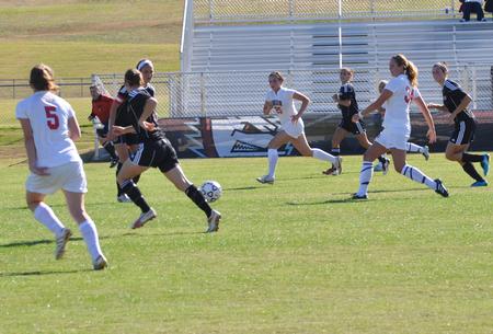 Union Soccer moves the ball up the field against Benedictine. - Photo by Steven Aldridge